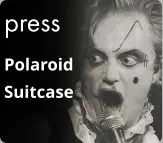 press Polaroid Suitcase